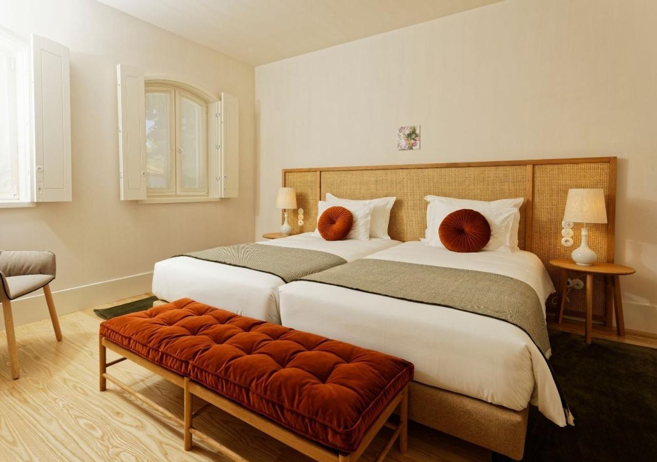 Montebelo Vista Alegre Ilhavo Hotel Ngoại thất bức ảnh A bedroom at the hotel