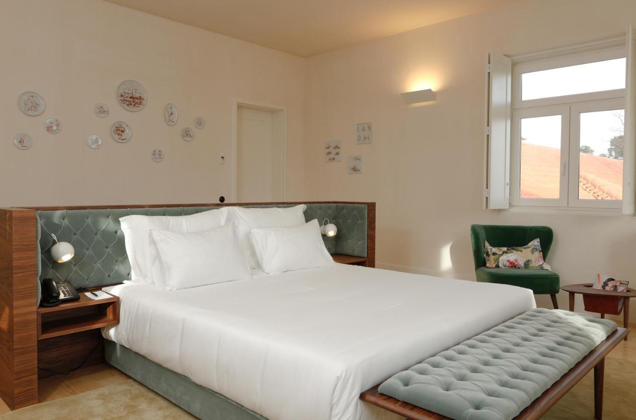 Montebelo Vista Alegre Ilhavo Hotel Ngoại thất bức ảnh A bedroom at the hotel