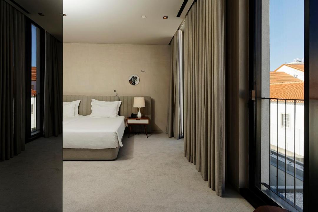 Montebelo Vista Alegre Ilhavo Hotel Ngoại thất bức ảnh A bedroom at The Ritz Lisbon